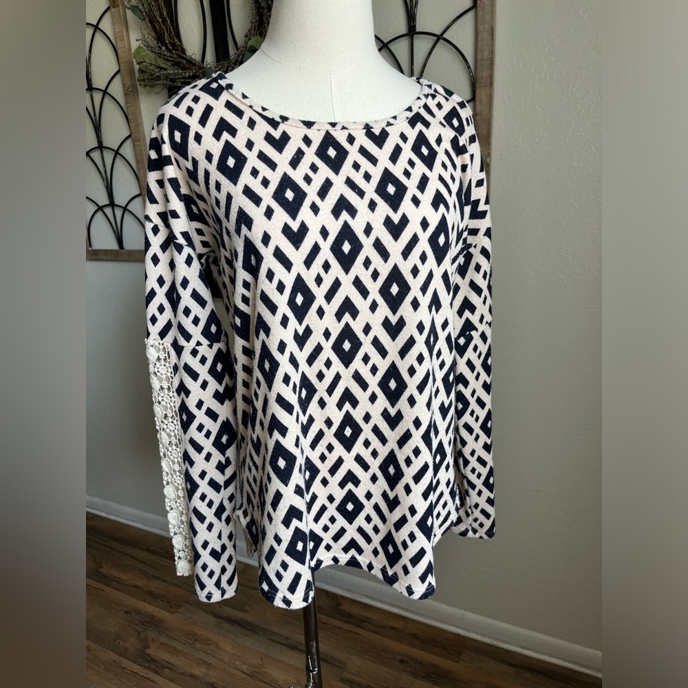 Used- good condition fantastic fawn sweater size medium